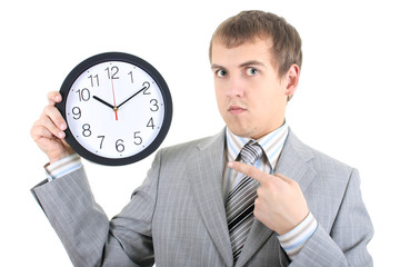 young businessman holding a clock