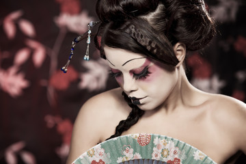 portrait of a beautiful white girl in geisha style
