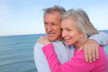 Closeup of senior couple by the sea