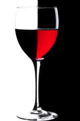 Glass of red wine over black and white background