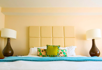 Double bed in the modern interior room