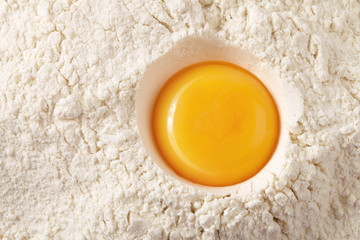 egg  yolk on flour, full frame - obrazy, fototapety, plakaty