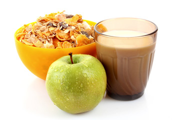 Muesli, apple and milk isolated on white