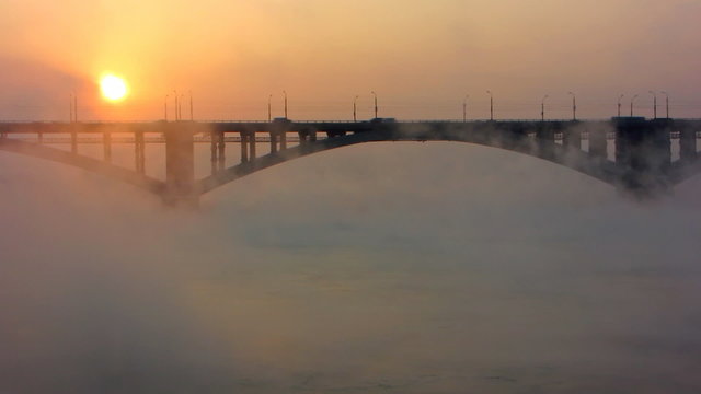 River,bridge, mist, sun.