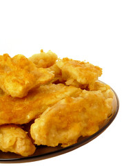 Cod in batter isolated on a white background