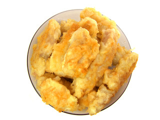 Cod in batter isolated on a white background