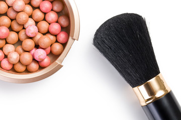 bronzing pearls and makeup brush