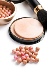 bronzing pearls and makeup brush