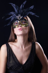 Fototapeta premium woman in mask kiss you
