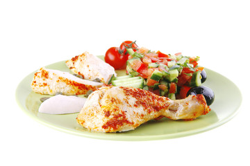 grilled meat drumstick served green