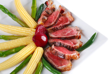 roasted beef served with corns