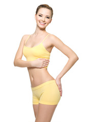 Fototapeta premium Happy young woman with beautiful slim body
