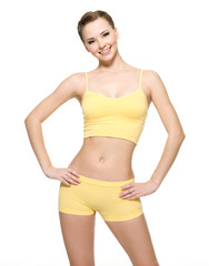 Fototapeta premium Happy young woman with beautiful slim body