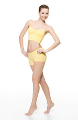 Fototapeta premium Happy young woman with perfect slim body