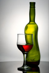wineglass and bottle on the desk. kitchen still-life