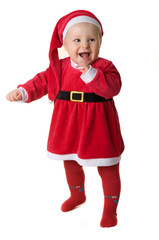 The baby is dressed in a Santa Claus