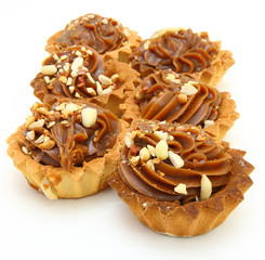 Pie a basket with chocolate condensed milk and nuts