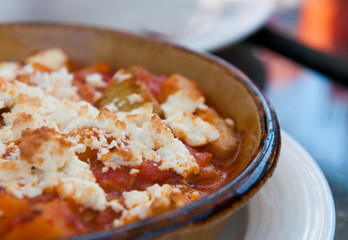 Greek food with cheese and tomato