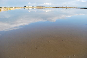 Scenic saltern and water reflections, Cervia, Ravenna, Italy