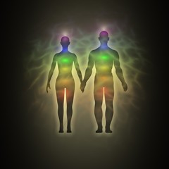 Woman and man silhouette with aura, chakras, energy