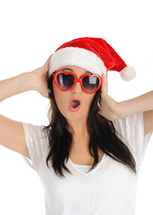 Funny sexy santa clouse woman in casual clothes, hat and red hea