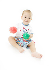 Fototapeta na wymiar Happy Boy with two balls, isolated on white