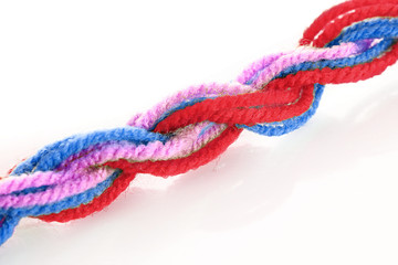 Twisted woolen coloured treads isolated  on white