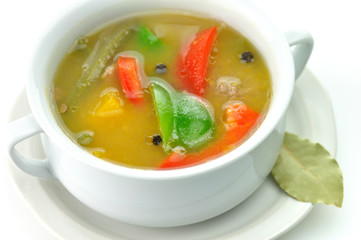 vegetable soup in a white soup cup