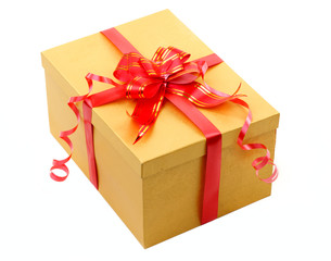 golden gift box with red bow isolated on white