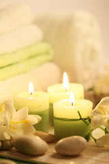 Fototapeta na wymiar three candles in spa composition