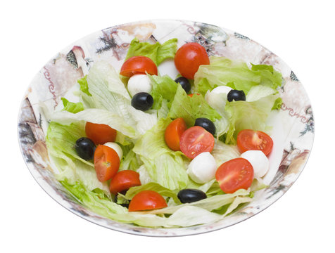 Salad with  Iceberg, olives, tomattos cherry and cheese Mozzarel