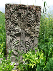 Old Cross stone in grass