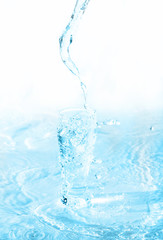 Fototapeta na wymiar Glass Of Water on white