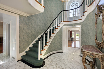Foyer with green stairs
