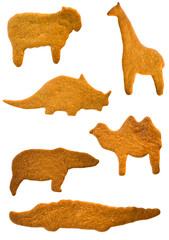 Six homemade gingerbread cookies shaped like animals