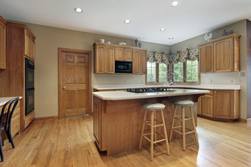 Kitchen with oak wood cabinetry