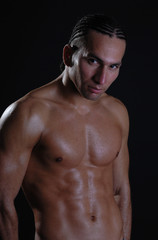 Fototapeta premium Young sexy man with great body