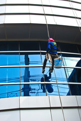 window washer on the department store mirror