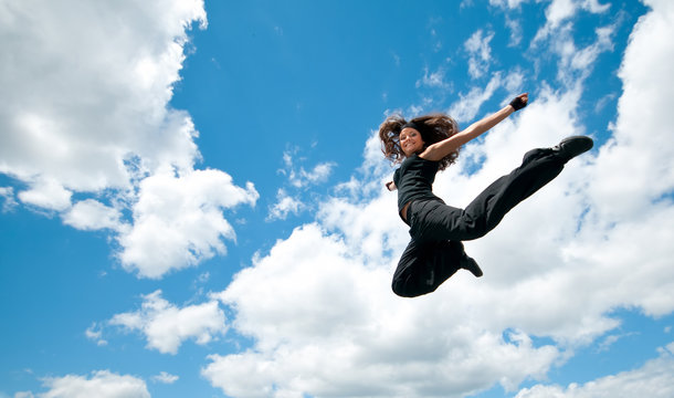 Jump over blue sky