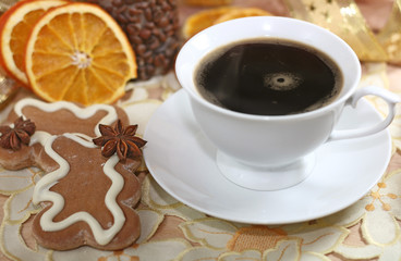 coffe, oranges  and gingerbreads with spices