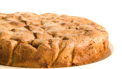 whole cinnamon apple pie  on a plate;