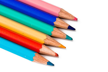 Many colored pencils isolated on white