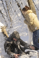 teens fighting with snowballs