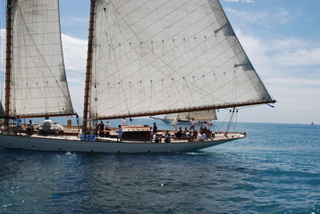 Fototapeta premium classic wood yacht under full sail