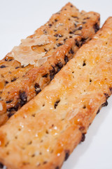 Add bread stick with chocolate side in