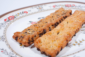 Add bread stick with chocolate side in
