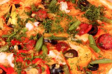 Obraz na płótnie Canvas fresh baked pizza with pepperoni olives and peppers