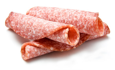 Slices of Salami isolated over white