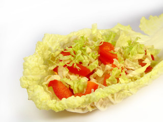 salad on lettuce leaf in the shape of a spoon