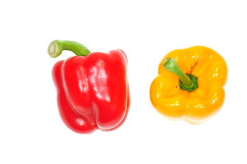 Yellow And Red Capsicum On White Background